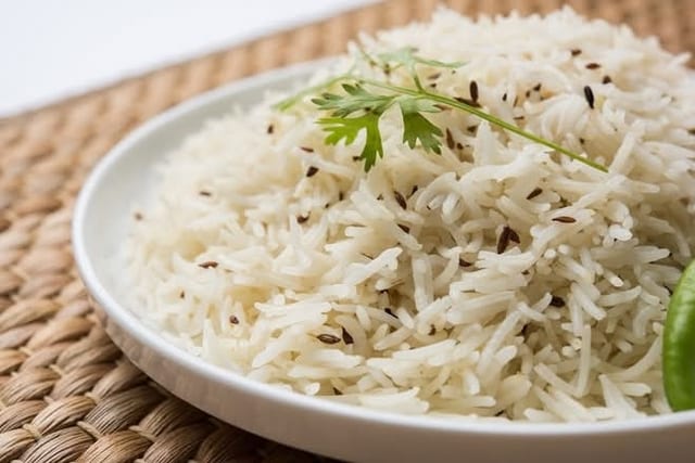 JEERA RICE HALF.