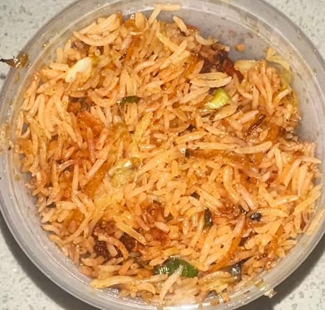 CHICKEN SCHEZWAN FRIED RICE.